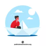 صبي في قارب ورقي