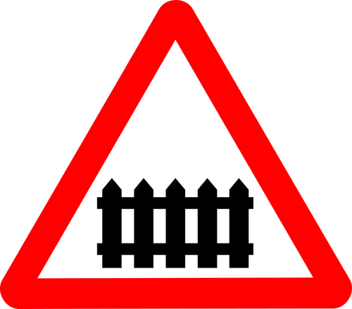 Znak drogowy ogrodzeniem
