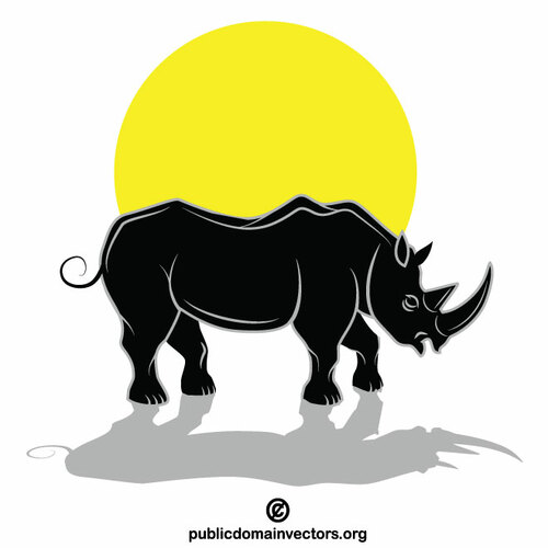 Силуэт носорога под солнцем