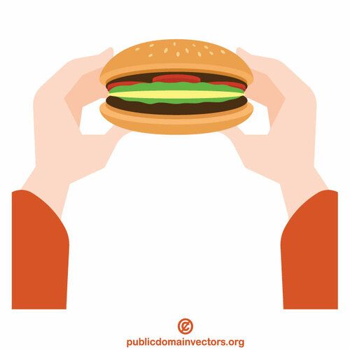Las manos sostienen una hamburguesa