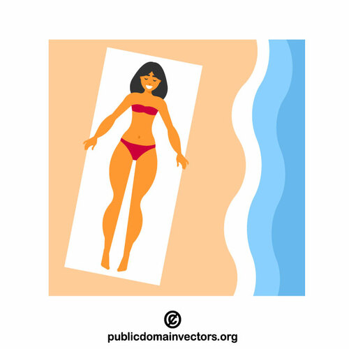 Kobieta opalająca się na plaży