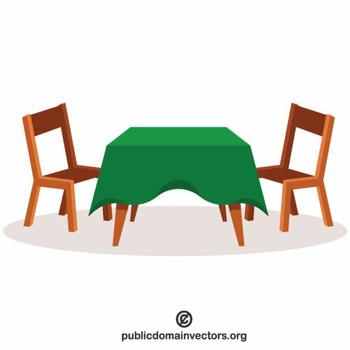 طاولة مع مفرش المائدة الأخضر