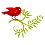 Oiseau rouge dans une branche