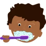 طفل أفريقي ينظف الأسنان