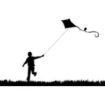 Boy und fliegender kite