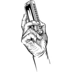 Hand holding harmonica