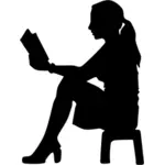 אישה קוראת ספר