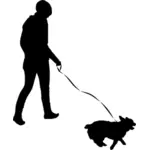 Silhouette di donna camminare cane