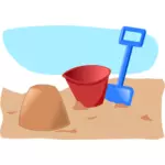 Vektoripiirros hiekkalinnasta ämpärillä ja lapiolla