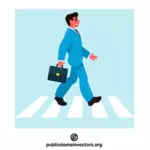 Hombre de negocios en un paso de peatones