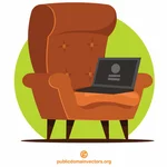 Vieille chaise avec l’ordinateur portatif