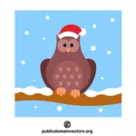 Burung hantu Natal mengenakan topi Santa