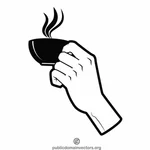 Tasse de café dans une main