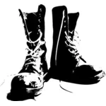 Zwart-wit beeld van laarzen