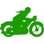 Vektorigrafiikka vihreästä moottoripyöräilijästä