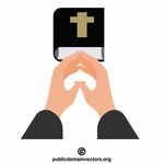 Betende Hände und die Bibel