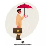 Liikemies, jolla on sateenvarjo
