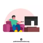 Muž se dívá na televizi