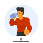 Tonåring dricker vatten från ett glas