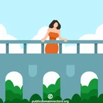 Frau auf einer Brücke
