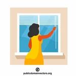 Woman opens the blinds
