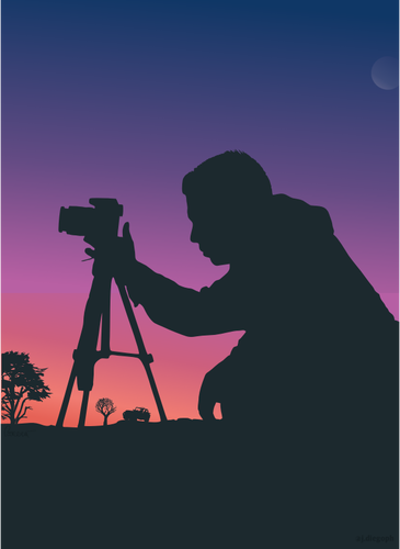 Camarógrafo en puesta del sol