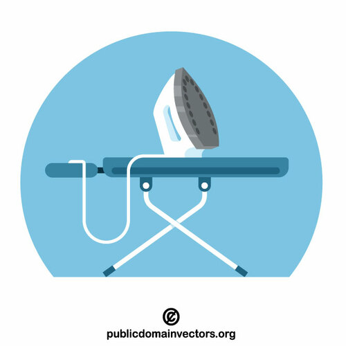 Iron standing on an ironing board