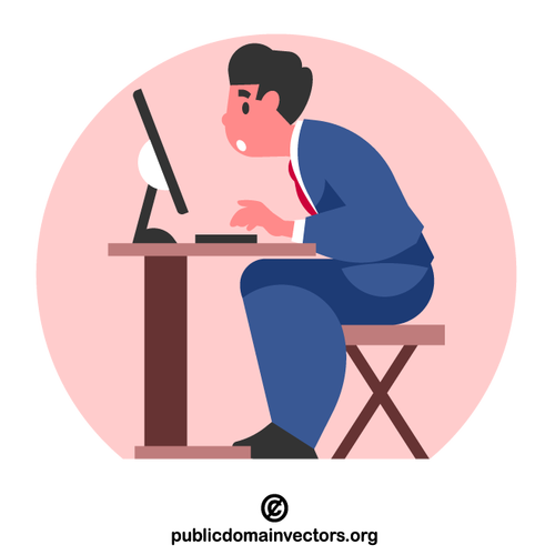 Man sitting by computer desk