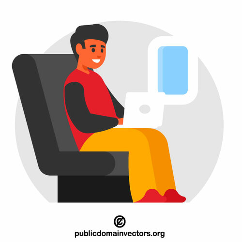 Man using laptop on an airplane