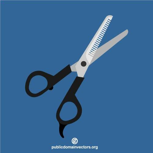 Scissors on blue background