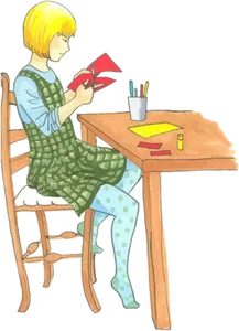 Blond holka dělá řemesel na stůl