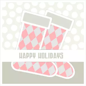 Immagine vettoriale di due calze di Natale su un biglietto d'auguri