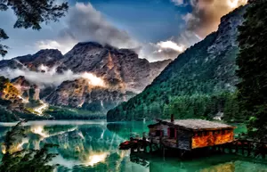 Calm lake with a house