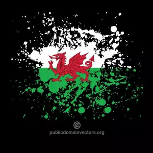 Bandera de país de Gales en salpicaduras de tinta