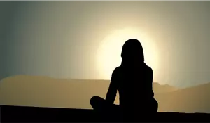 Woman and sunset