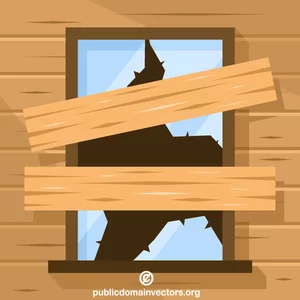 Fenêtre cassée avec des planches en bois