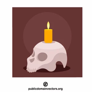 Burning candle in a skull