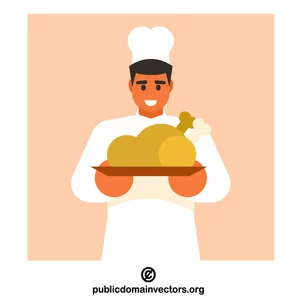 Šéfkuchař drží talíř se smaženým kuřecím masem
