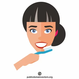 Jente rengjøring tenner