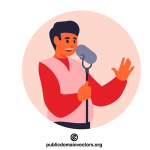 Man stands behind microphone