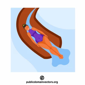 Mujer montando por tobogán acuático