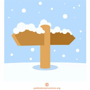 Cartello di legno coperto di neve