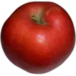 Punainen omena vihreällä lehdellä