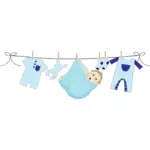 Baby boy hanging on a clothesline