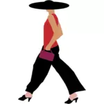 Modebewusste Frau zu Fuß