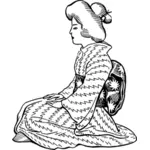 Japanilainen nainen istuu