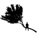 Muž na stromě