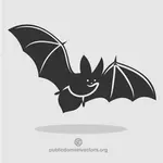 Bat silhouette with red eyes vector clip art