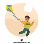 Boy playing with a kite