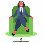 Businesswoman sitting in a chair